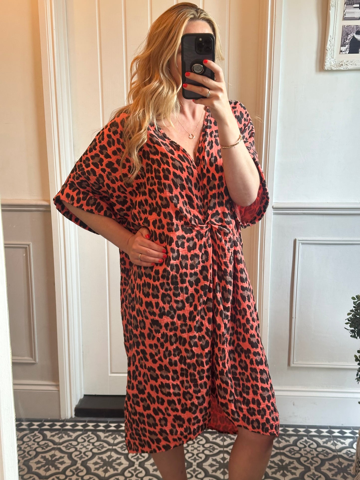 Orange animal print twist dress