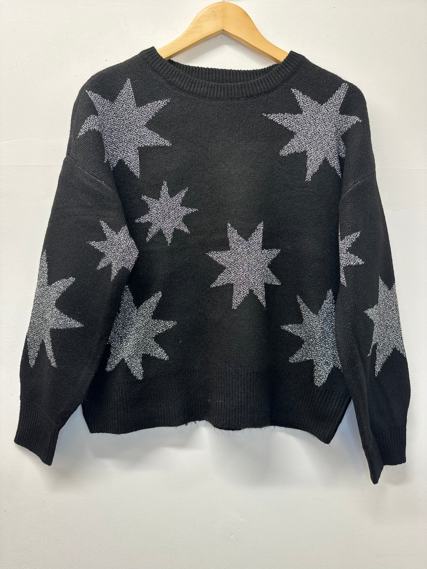 Black knitted star glitter jumper