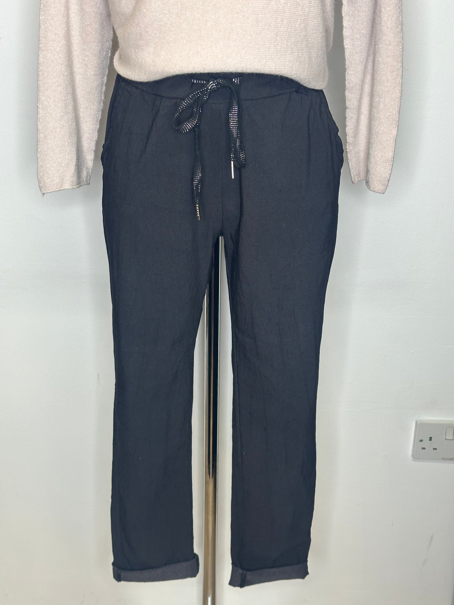 Black stretch trousers